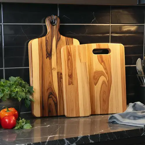 Separate cutting boards for raw turkey and vegetables to prevent cross-contamination, with gluten-free lentils.