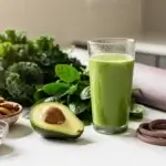 Kelly Ripa diet and exercise lifestyle photo: fresh produce and fitness gear on a sunlit kitchen counter.